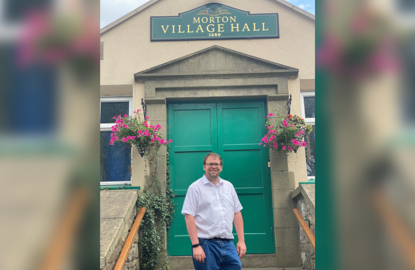 Mark on the Steps of Morton Village Hall.