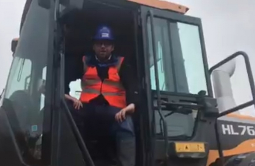 Mark Fletcher MP rides on one of the many diggers on the Coalite site