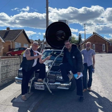 Mark Fletcher MP with Joilet Jake Blues and his famous car whilst out canvassing