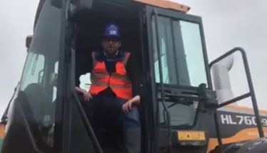 Mark Fletcher MP rides on one of the many diggers on the Coalite site