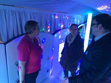 Mark Fletcher MP aboard the sensory bus with representatives from the Riley Foundation and SEND'S