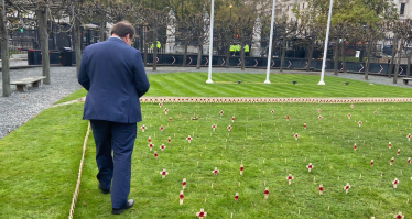 Mark laying his cross